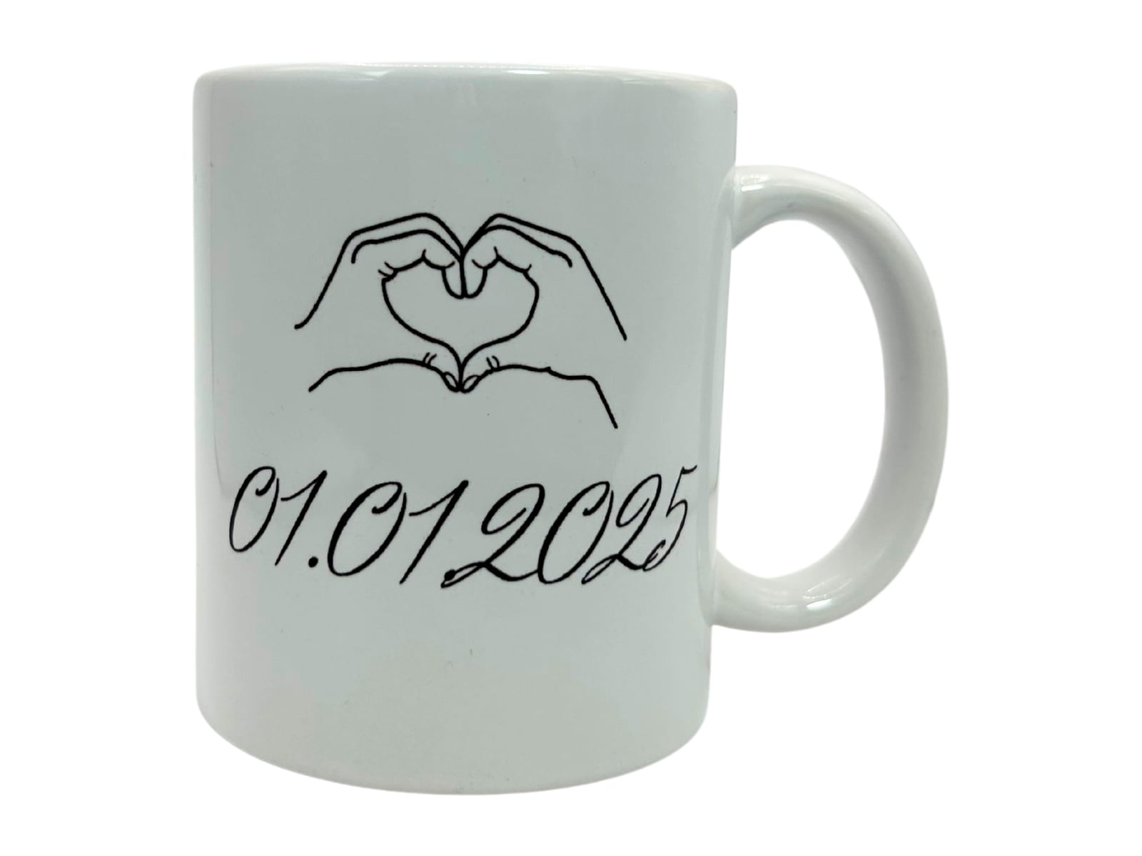 Example: LivaGlow ceramic mug printed with a heart made of two hands and the date 01.01.2025
